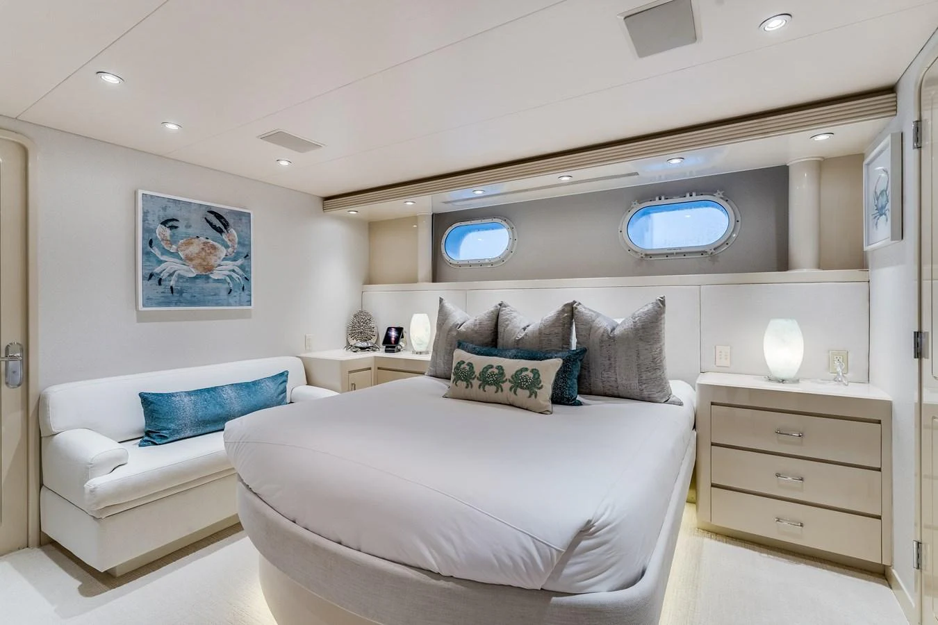 a room with a bed and a couch aboard CUPCAKE Yacht for Sale