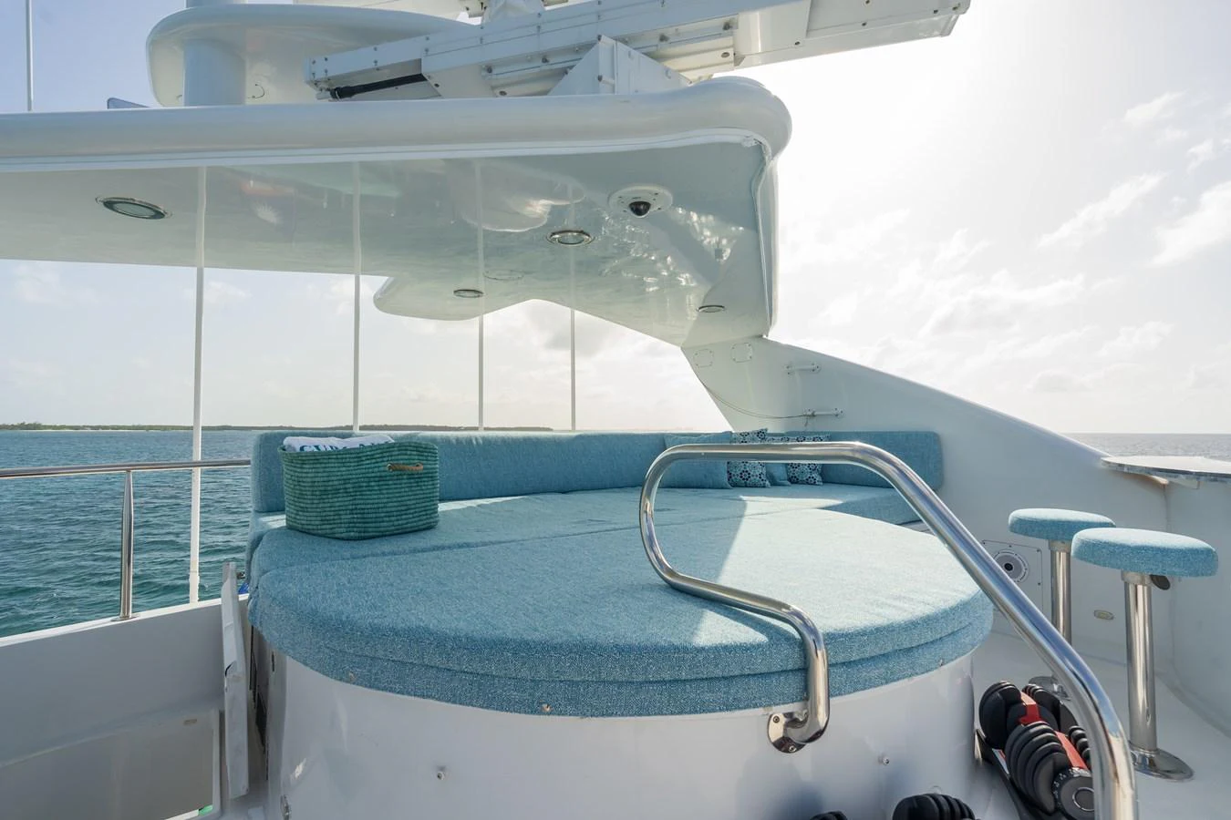 a boat with a blue cover aboard CUPCAKE Yacht for Sale