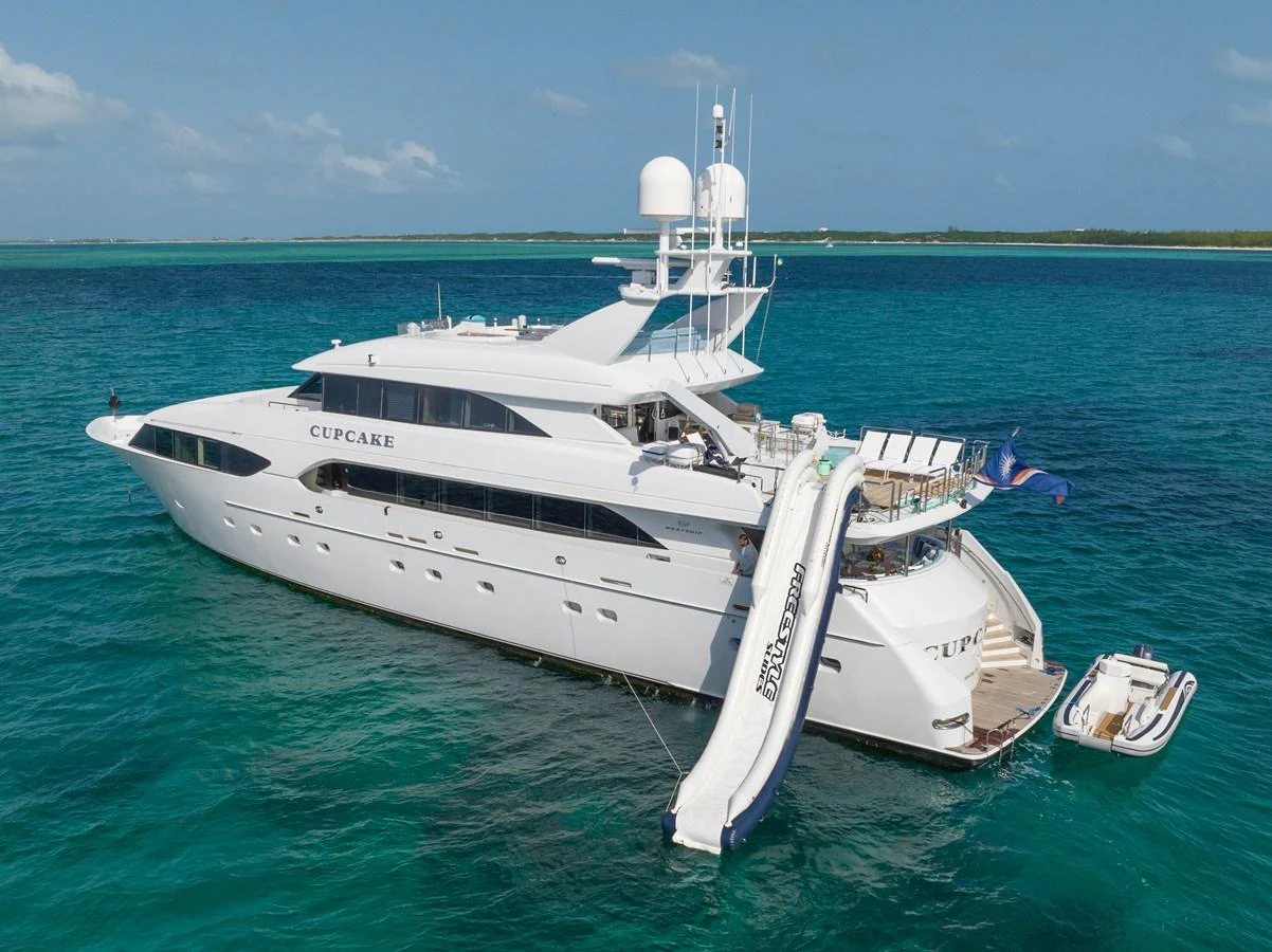 a white yacht in the water aboard CUPCAKE Yacht for Sale