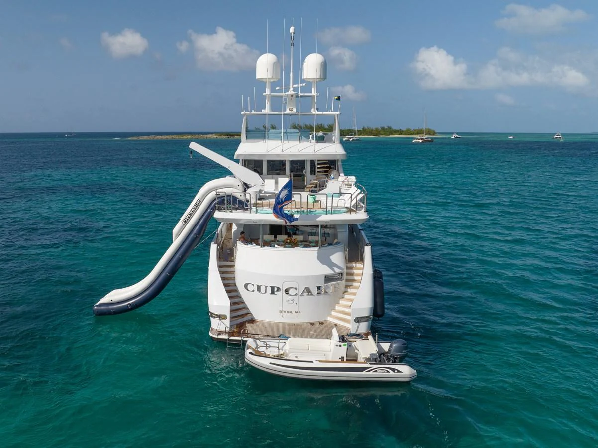 a white boat on the water aboard CUPCAKE Yacht for Sale
