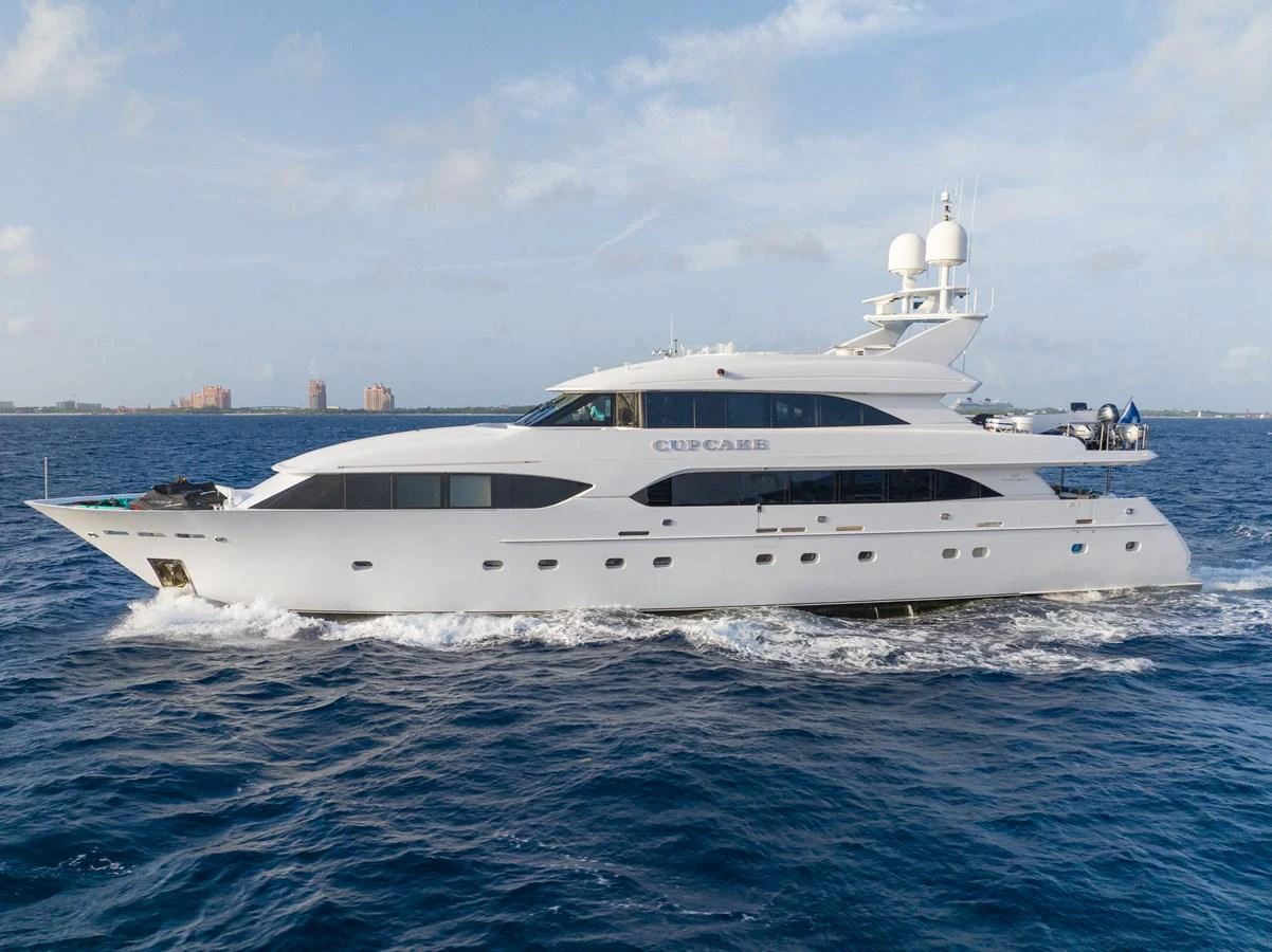 a white yacht in the water aboard CUPCAKE Yacht for Sale