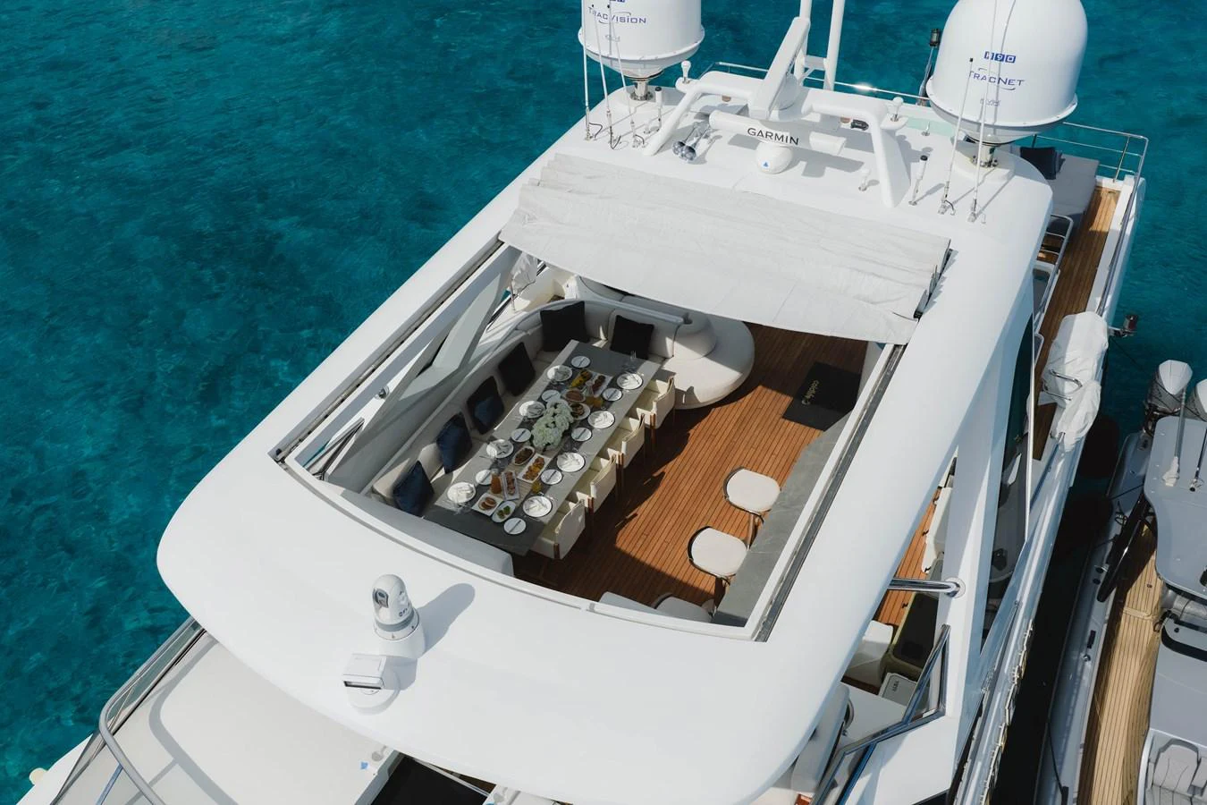 a white boat with a metal frame aboard CARPE DIEM Yacht for Sale