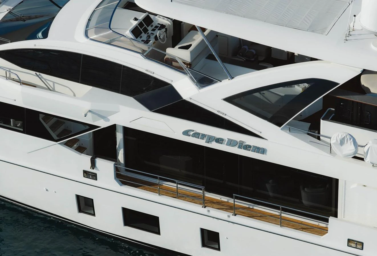 a white yacht in the water aboard CARPE DIEM Yacht for Sale