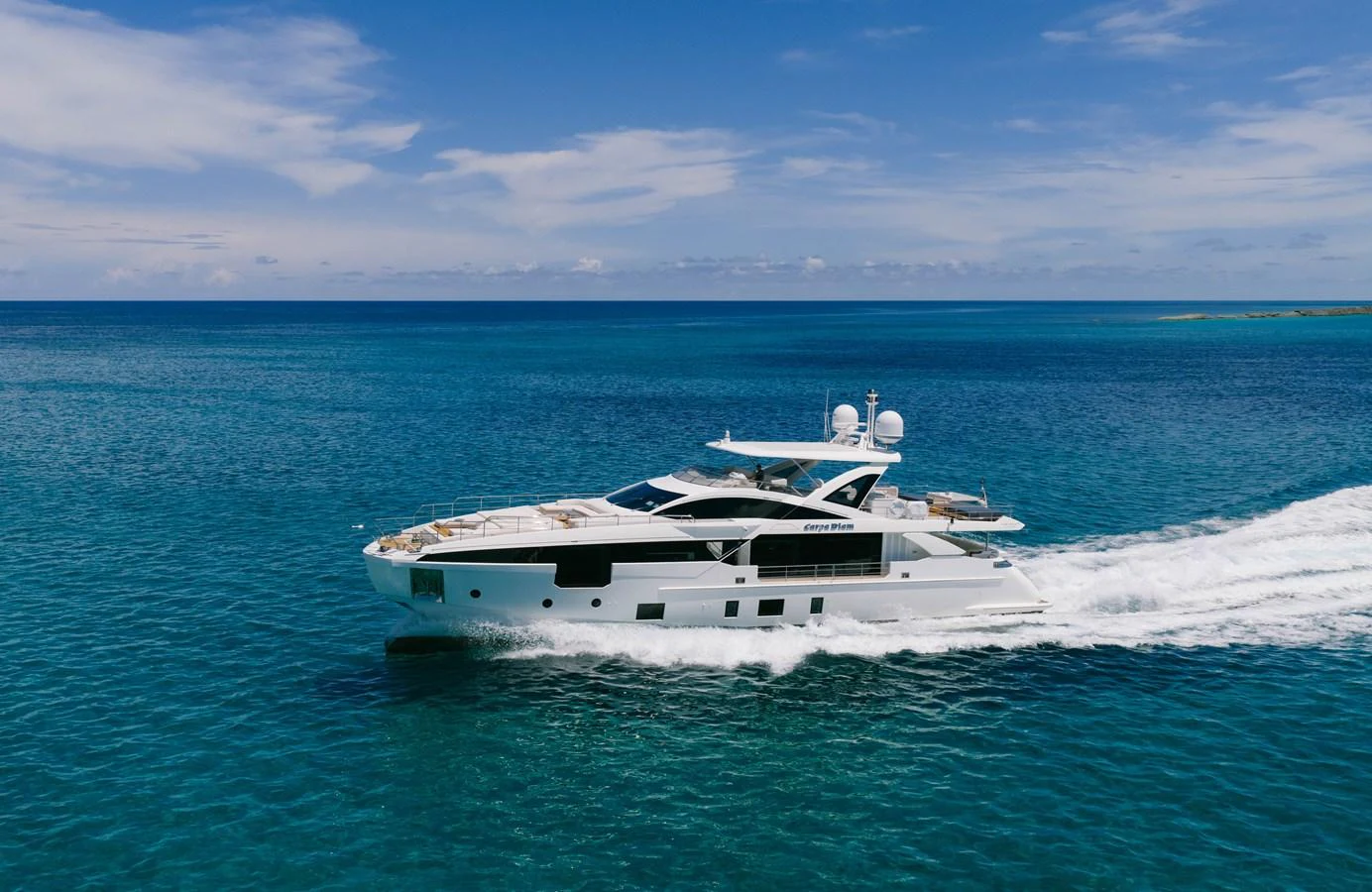 a white yacht in the water aboard CARPE DIEM Yacht for Sale
