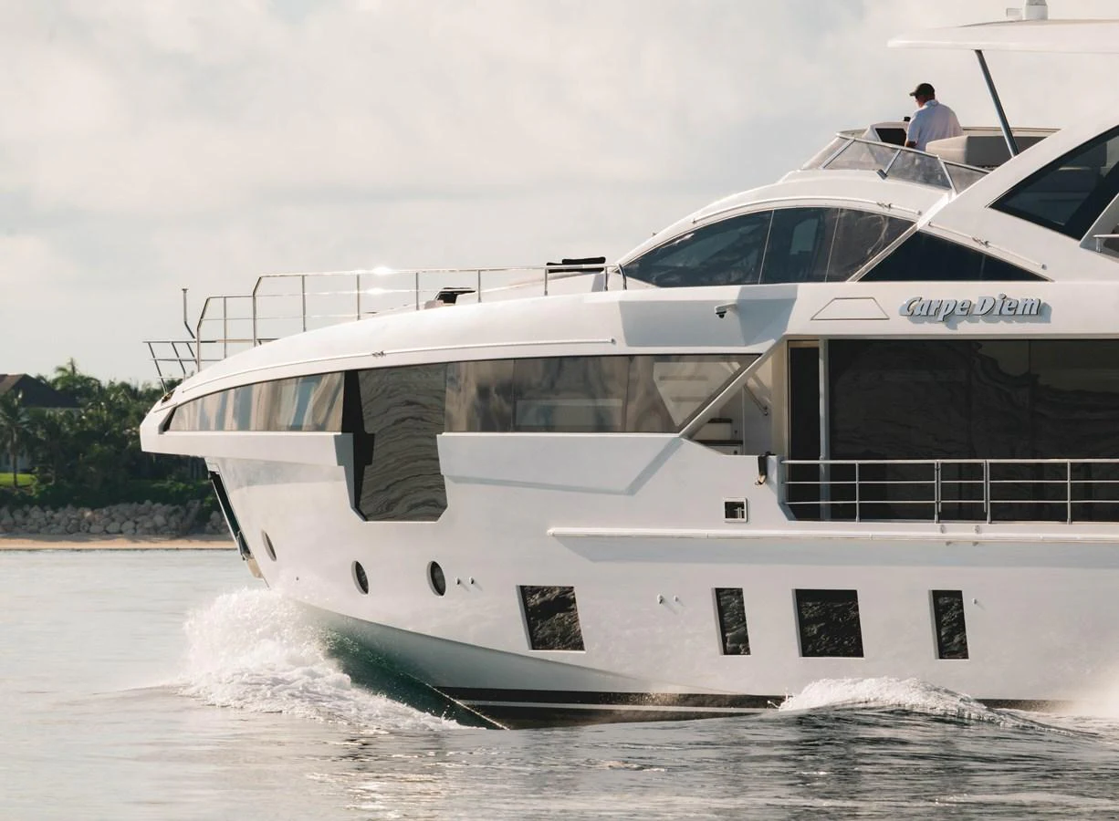 a white yacht on the water aboard CARPE DIEM Yacht for Sale