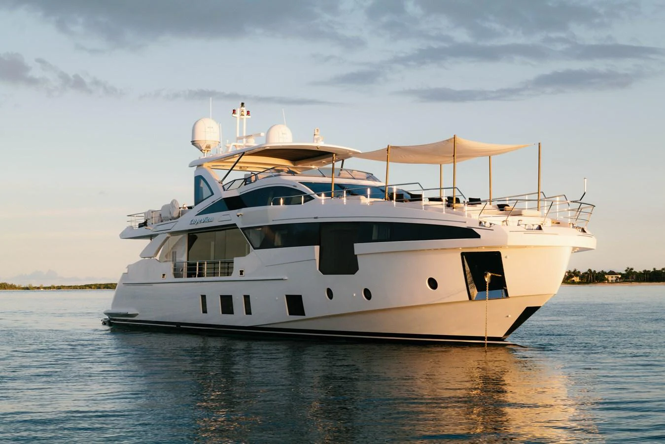 a white boat on the water aboard CARPE DIEM Yacht for Sale