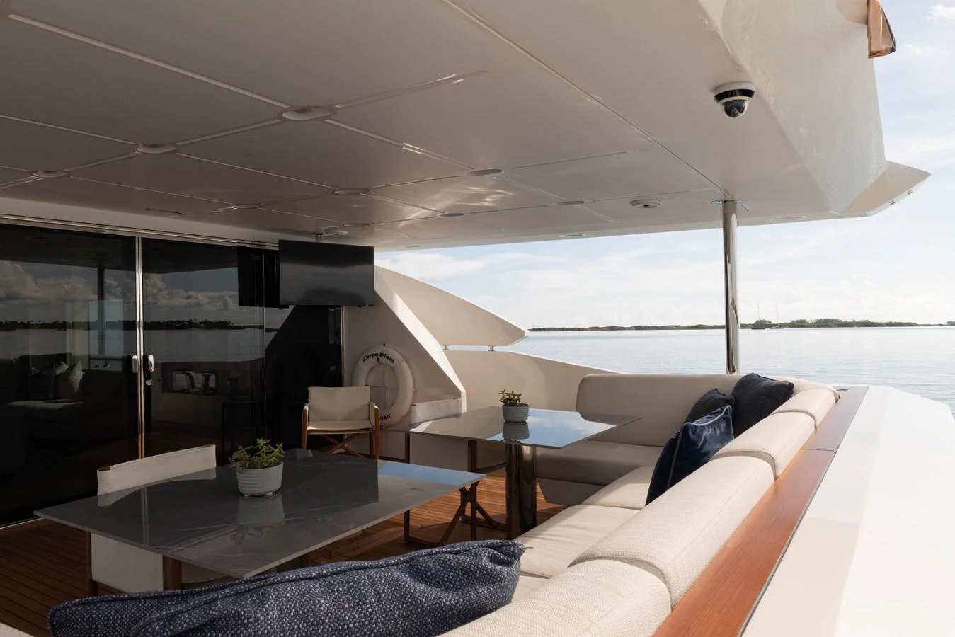 a living room with a large glass window aboard CARPE DIEM Yacht for Sale