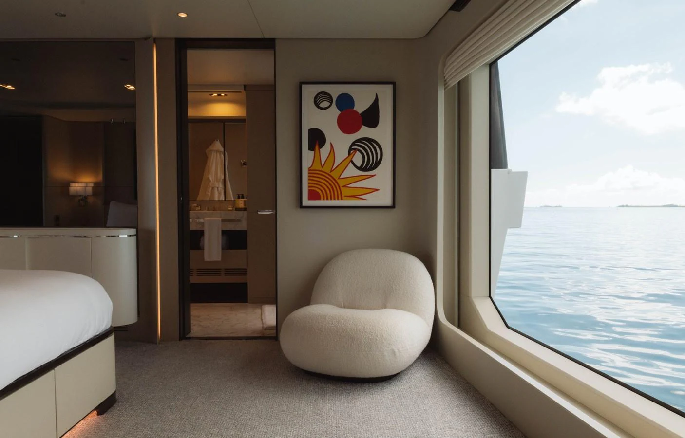 a room with a large window and a large white chair aboard CARPE DIEM Yacht for Sale