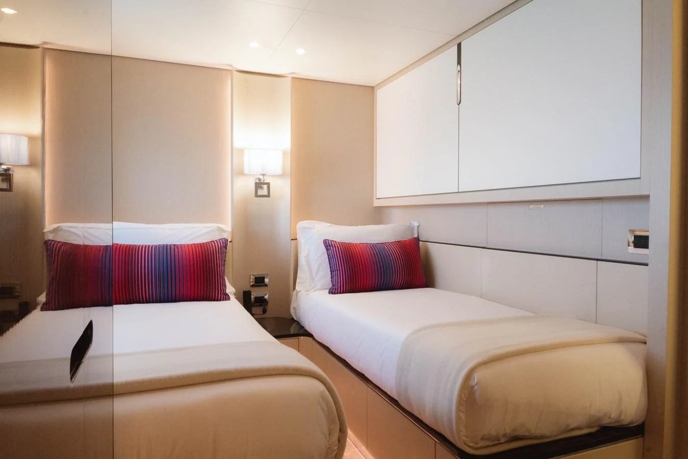 a couple of beds in a hotel room aboard CARPE DIEM Yacht for Sale