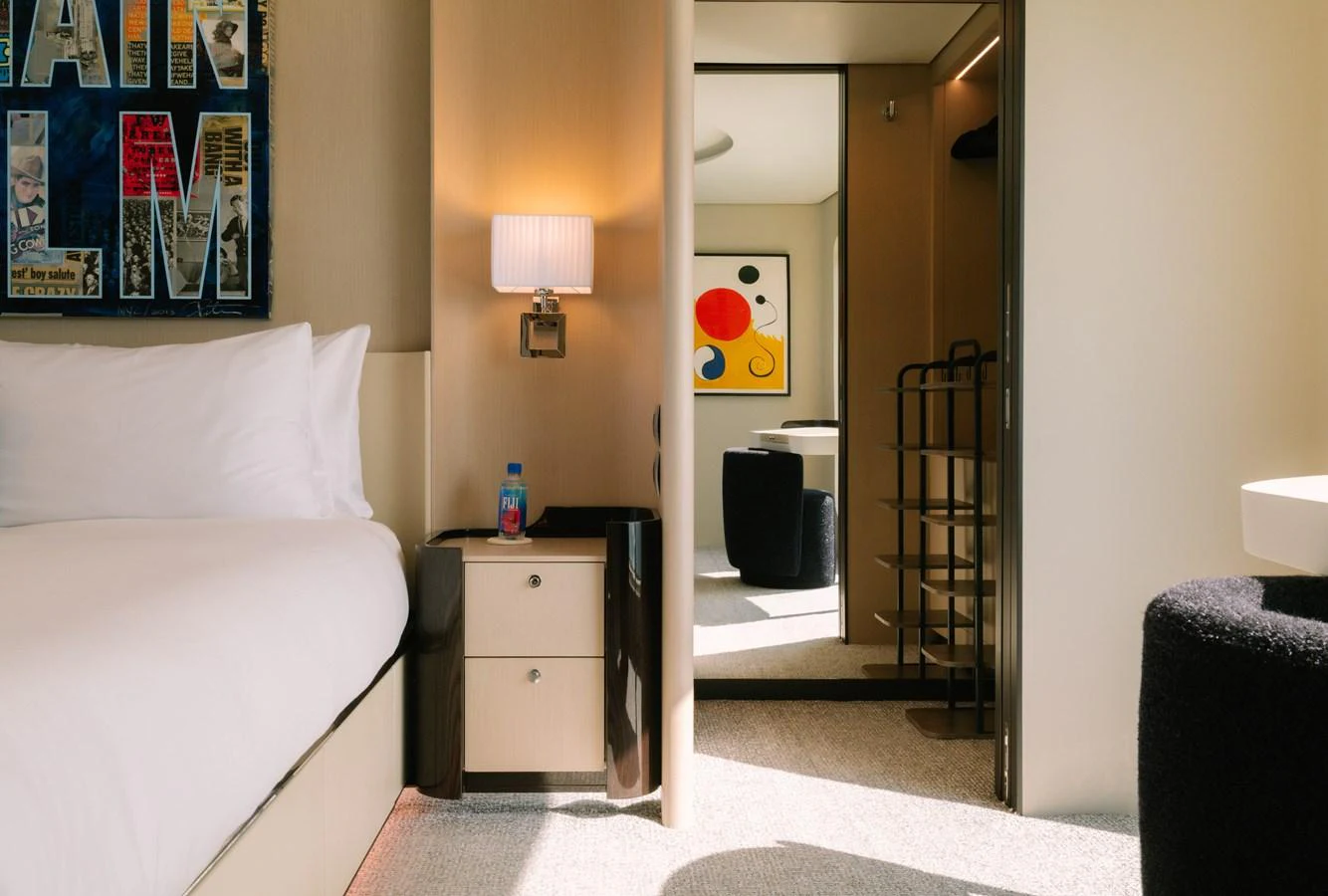 a bedroom with a bed and a ladder aboard CARPE DIEM Yacht for Sale