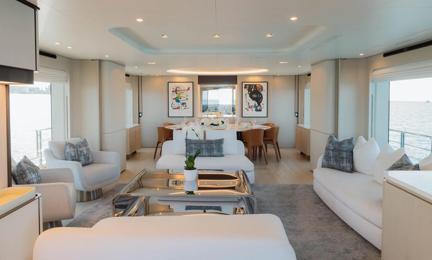 a living room with a large window aboard CARPE DIEM Yacht for Sale