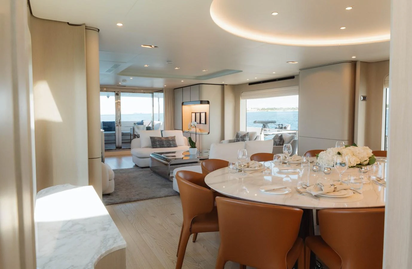 a dining room with a table and chairs aboard CARPE DIEM Yacht for Sale