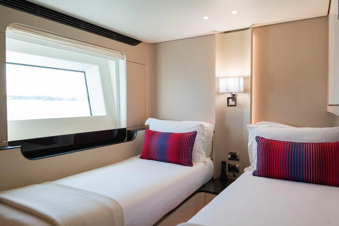 a room with two beds aboard CARPE DIEM Yacht for Sale