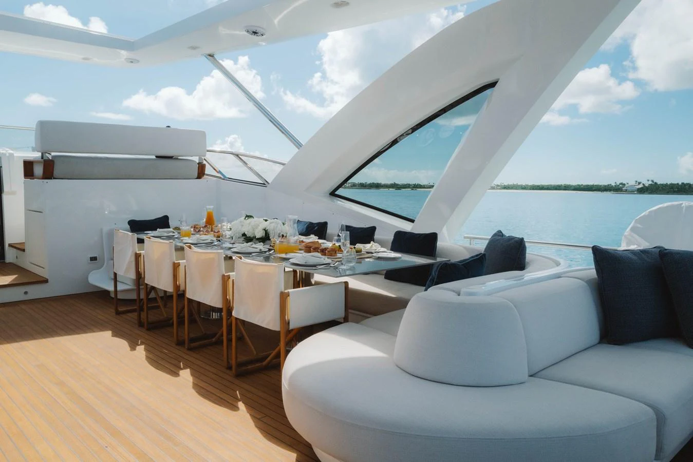 a room with a table and chairs aboard CARPE DIEM Yacht for Sale