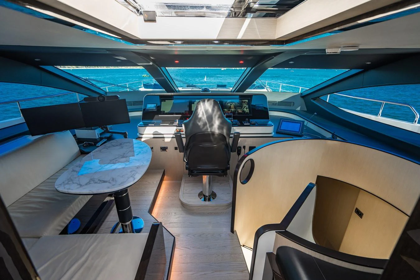 a person sitting in a chair in a vehicle aboard CARPE DIEM Yacht for Sale