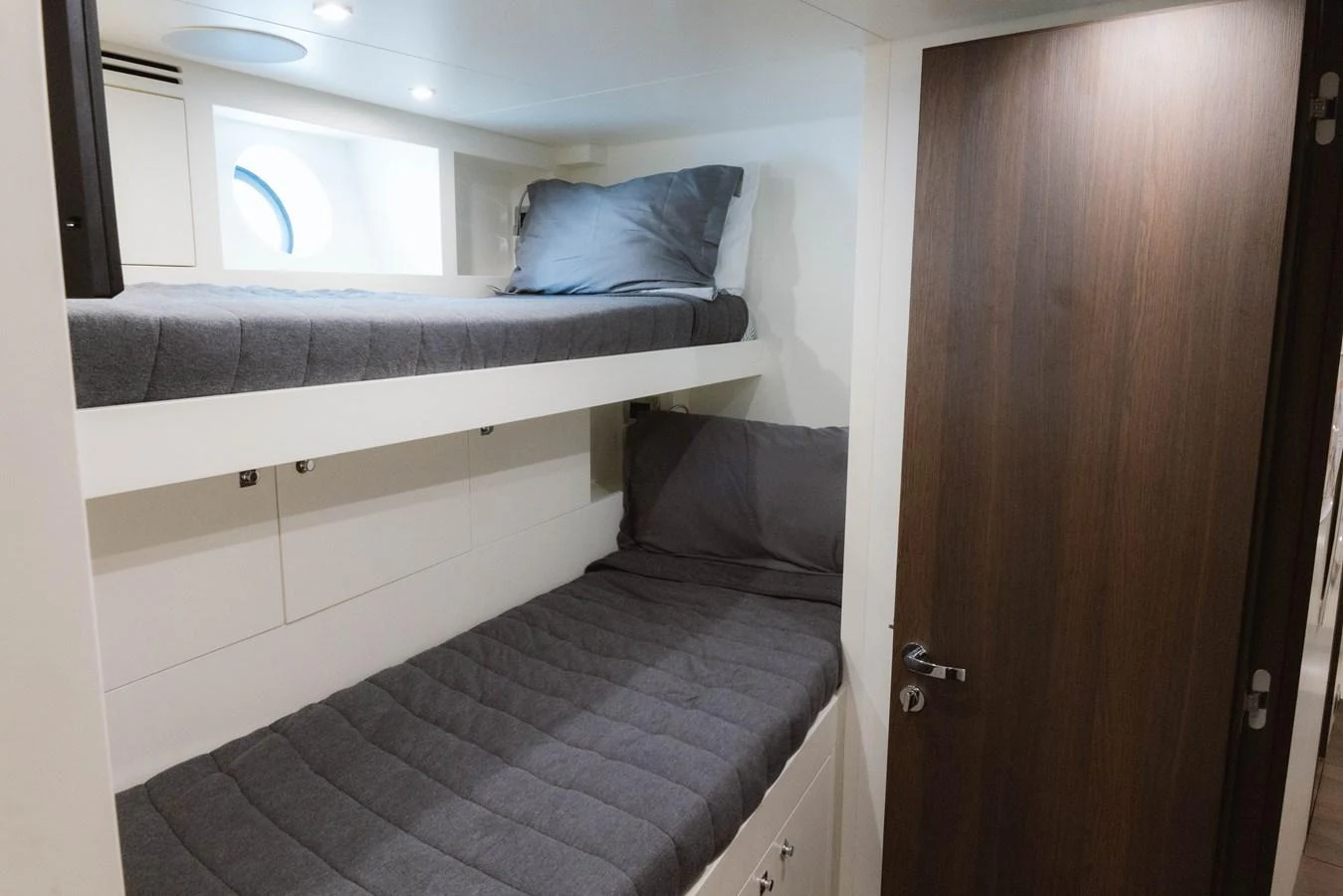 a bed in a room aboard CARPE DIEM Yacht for Sale