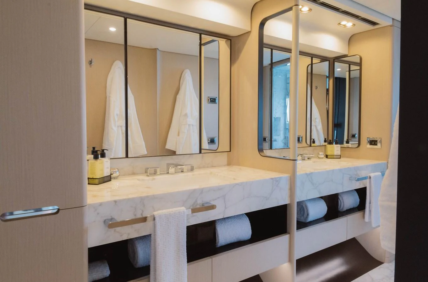 a bathroom with a large mirror aboard CARPE DIEM Yacht for Sale