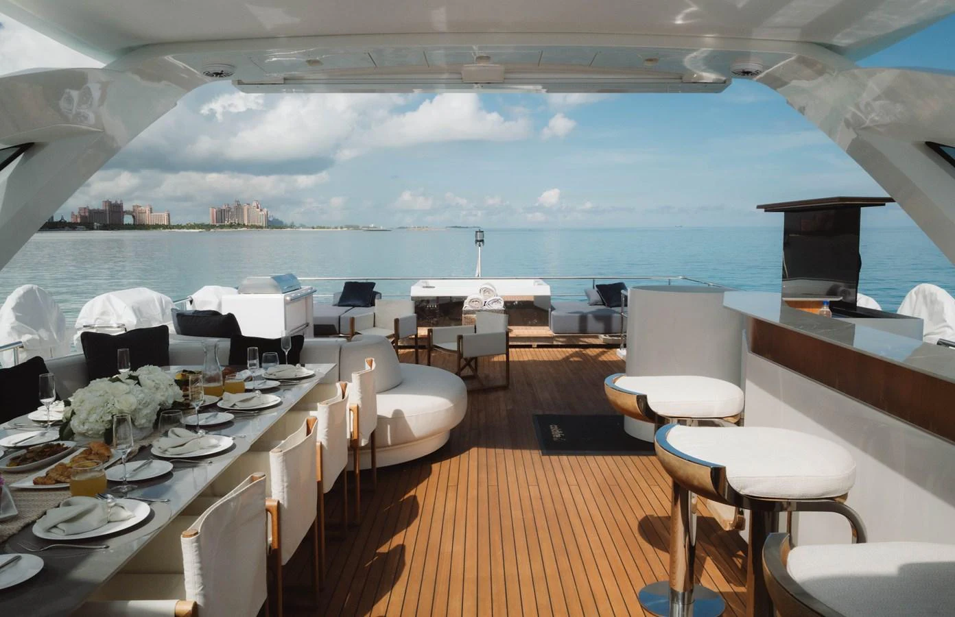 a room with tables and chairs aboard CARPE DIEM Yacht for Sale