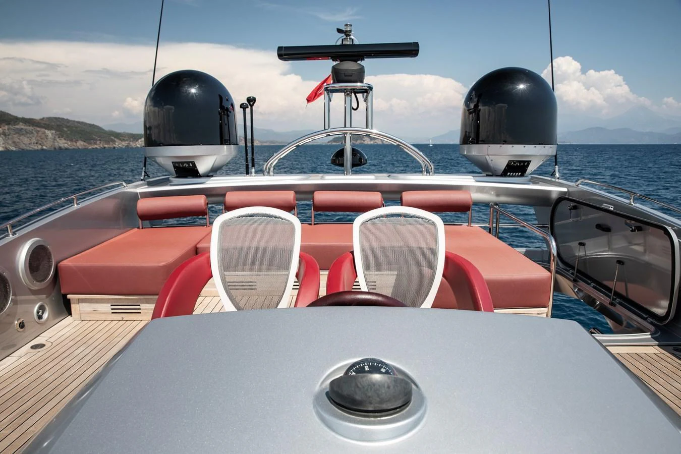The yacht's flybridge offers a sleek and modern design with ample seating and advanced navigation equipment. aboard AMARA Yacht for Sale