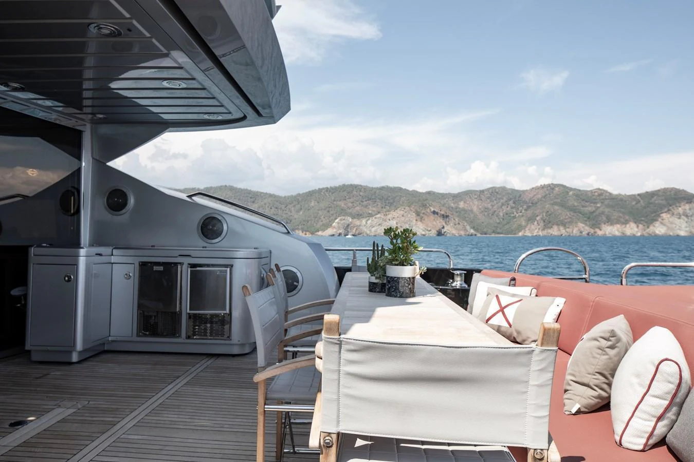 The aft deck offers a stylish and comfortable outdoor dining area with stunning sea views. aboard AMARA Yacht for Sale