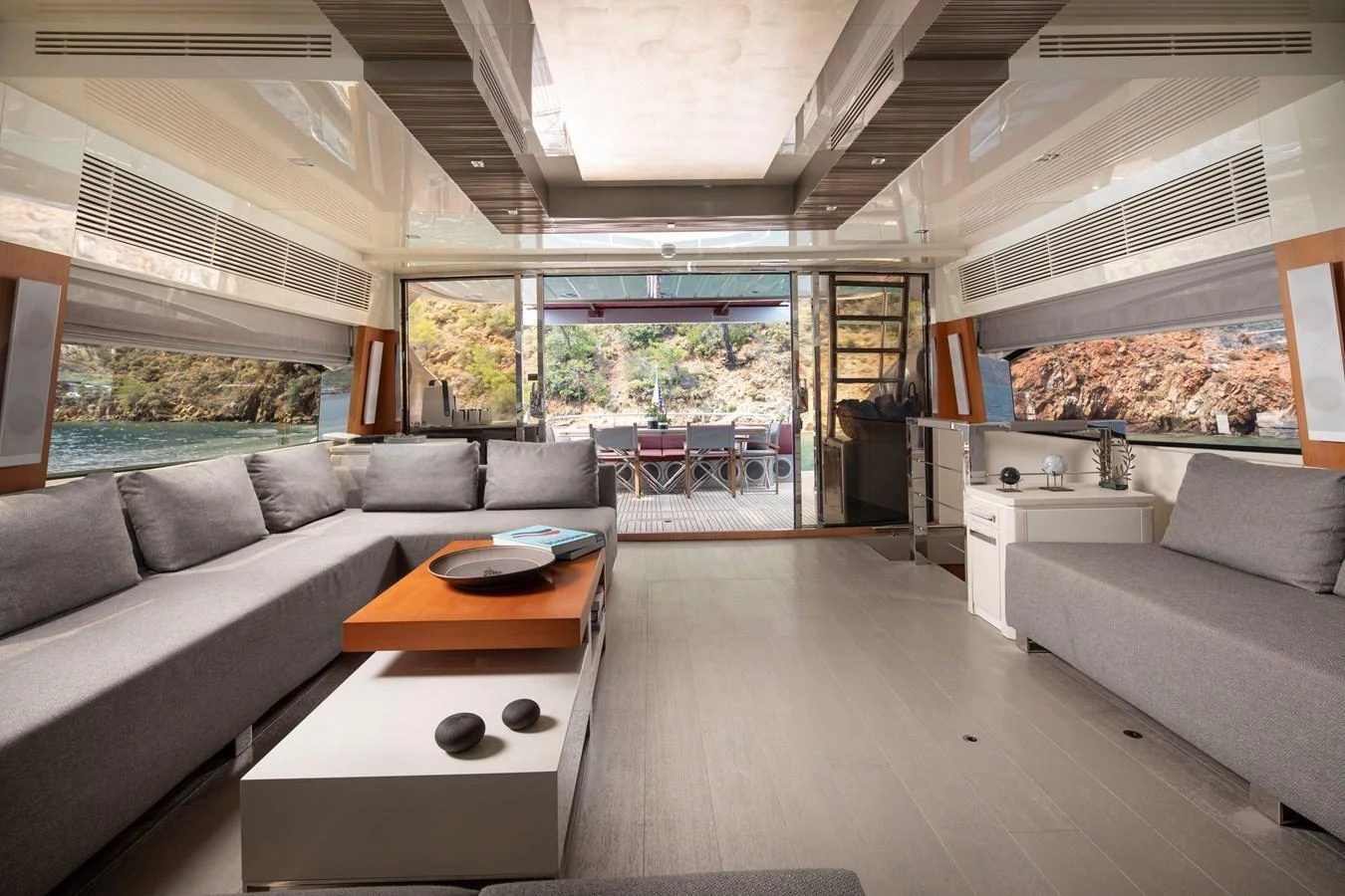 The spacious salon features modern furnishings and ample natural light. aboard AMARA Yacht for Sale