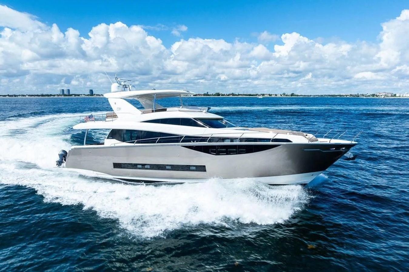 a white yacht on water aboard ELEVATION Yacht for Sale