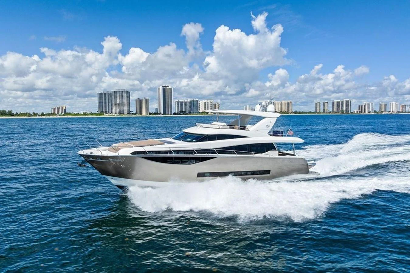 a white yacht on the water aboard ELEVATION Yacht for Sale