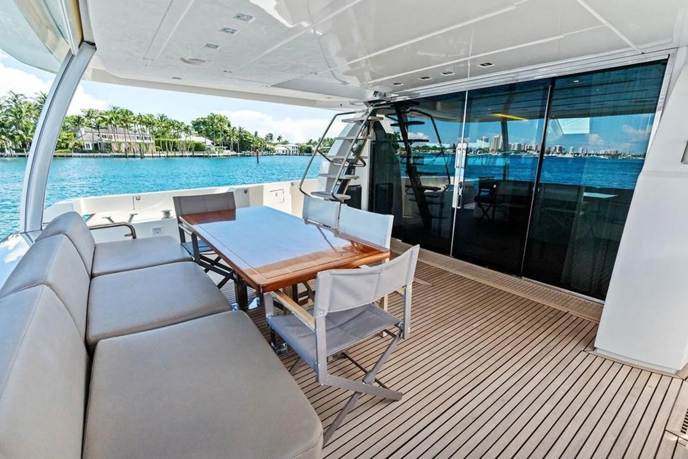 a room with a table and chairs aboard ELEVATION Yacht for Sale