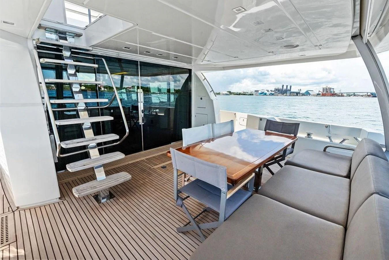 a room with a table and chairs aboard ELEVATION Yacht for Sale