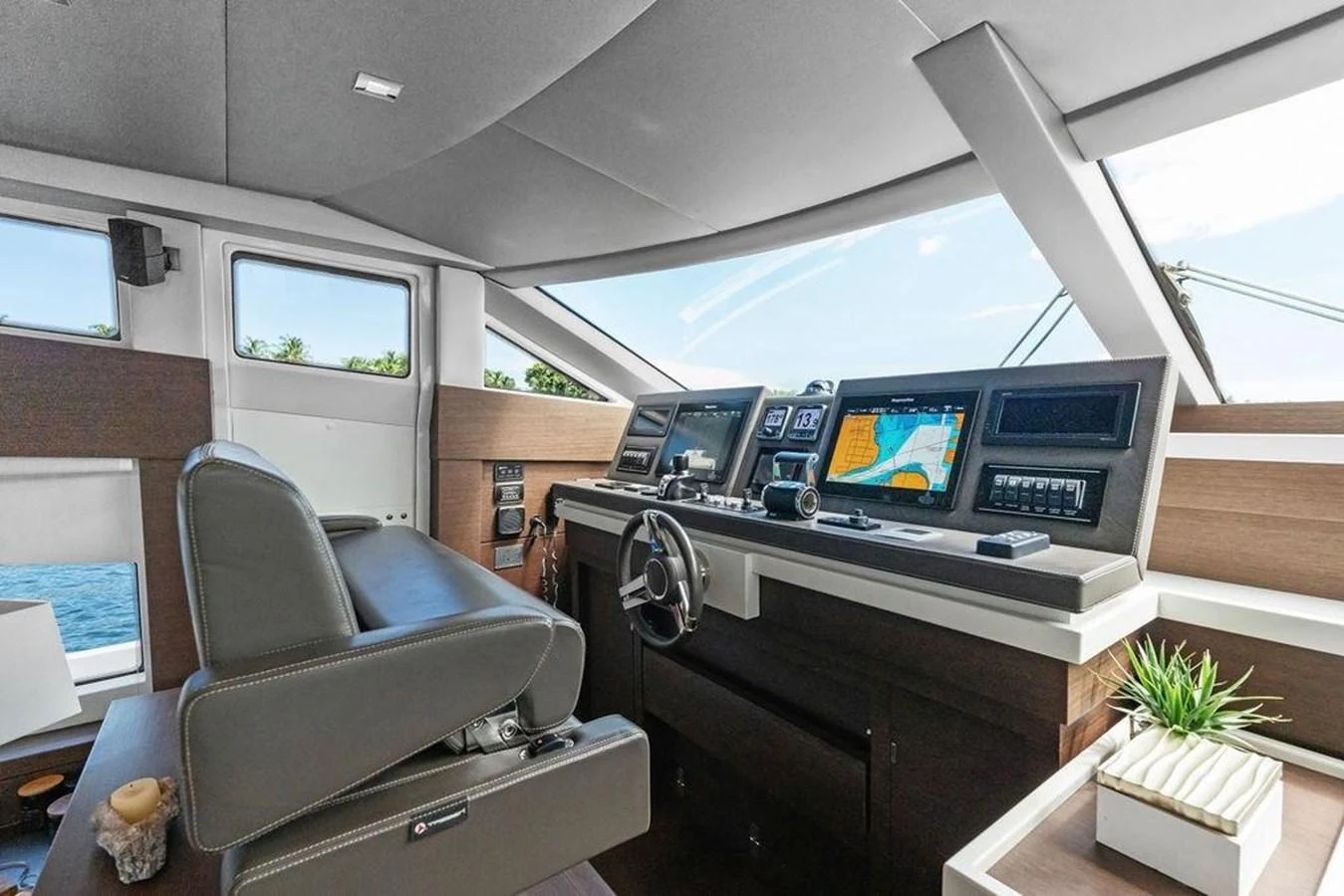 a room with a desk and a chair and a computer aboard ELEVATION Yacht for Sale