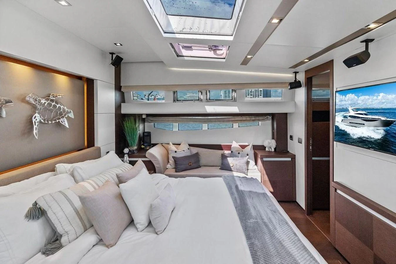 a room with a bed and a window aboard ELEVATION Yacht for Sale