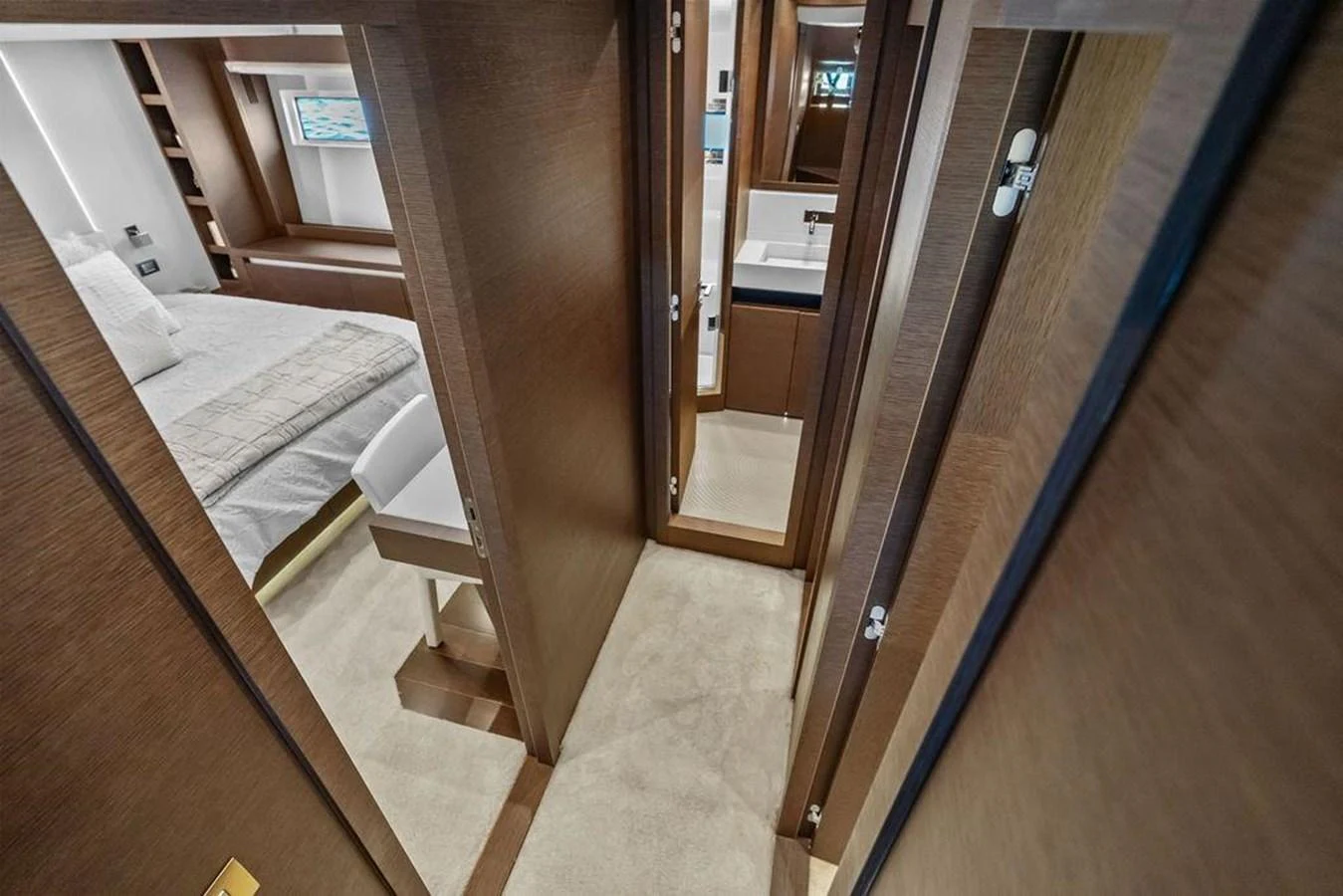 a room with a bed and a closet aboard ELEVATION Yacht for Sale