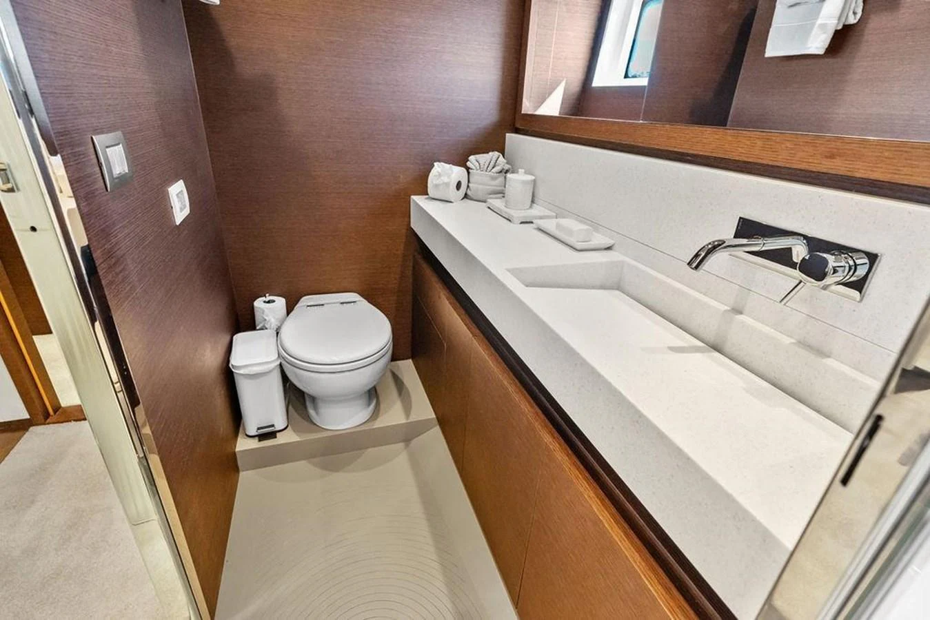 a bathroom with a sink toilet and a bathtub aboard ELEVATION Yacht for Sale