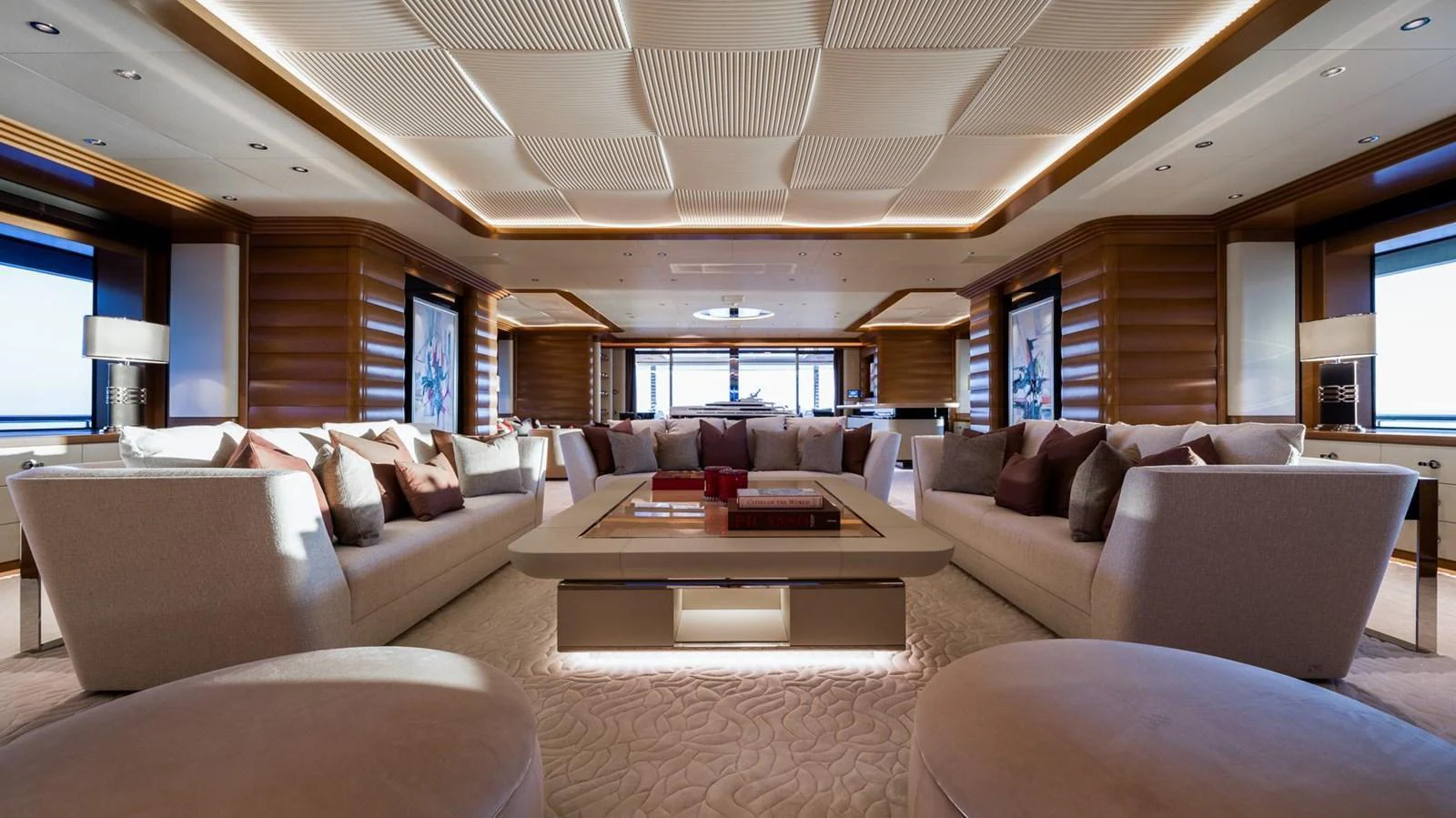 The spacious salon features luxurious seating and elegant decor, perfect for relaxation and entertainment. aboard LANA Yacht for Sale