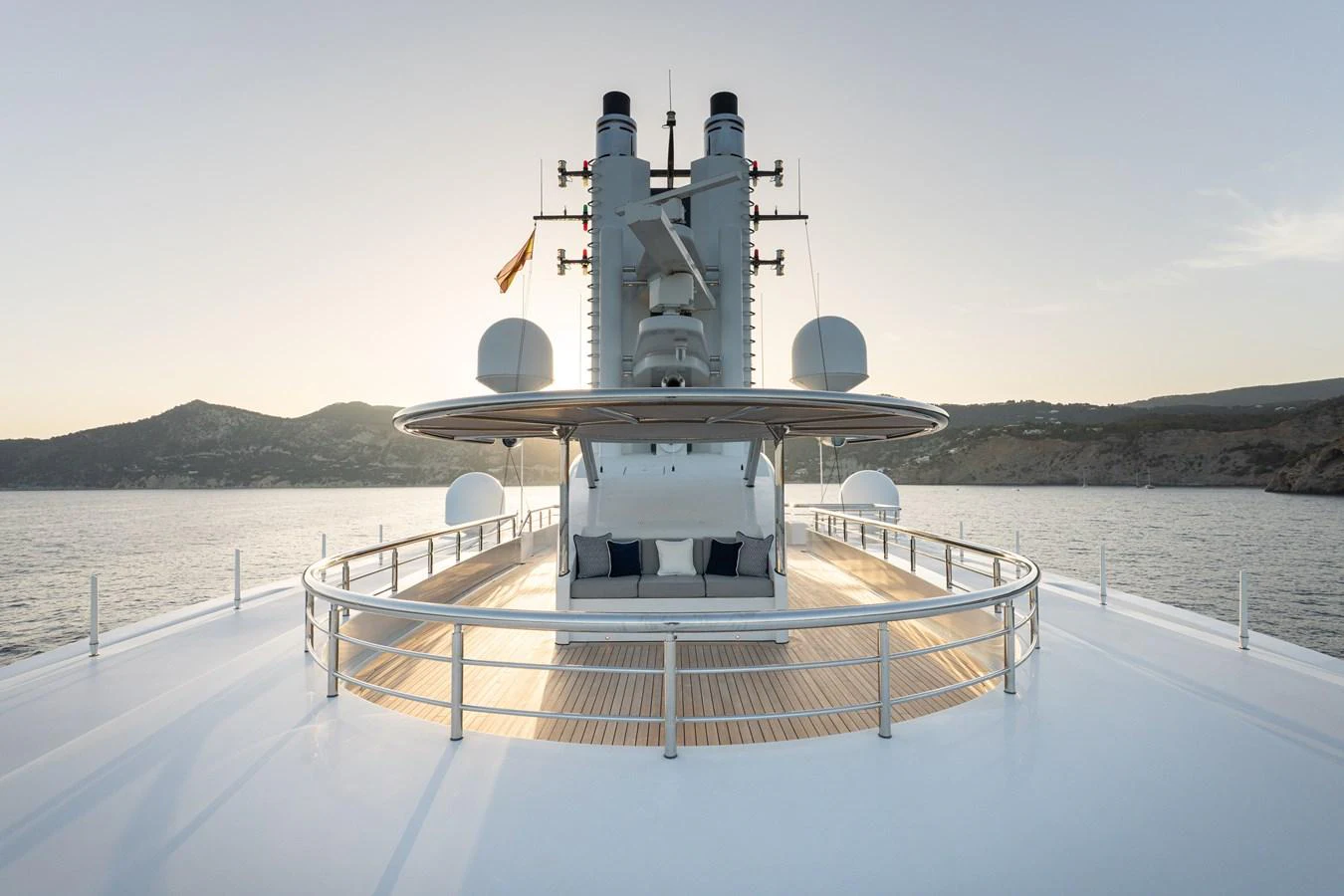 The yacht's expansive deck offers a serene and luxurious space with stunning views of the surrounding waters. aboard I DYNASTY Yacht for Sale
