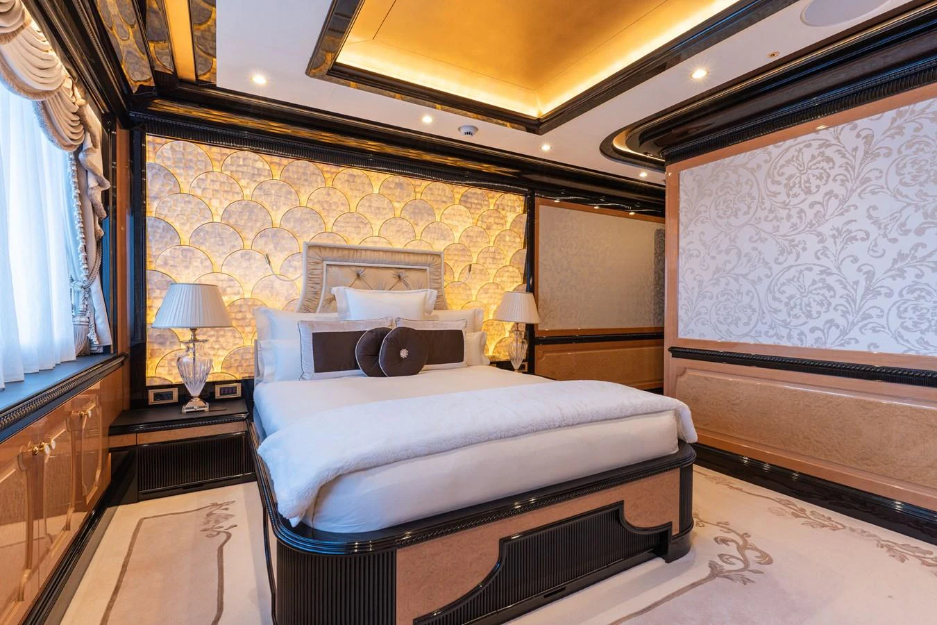 The master stateroom exudes opulence with its luxurious bedding and elegant decor. aboard I DYNASTY Yacht for Sale