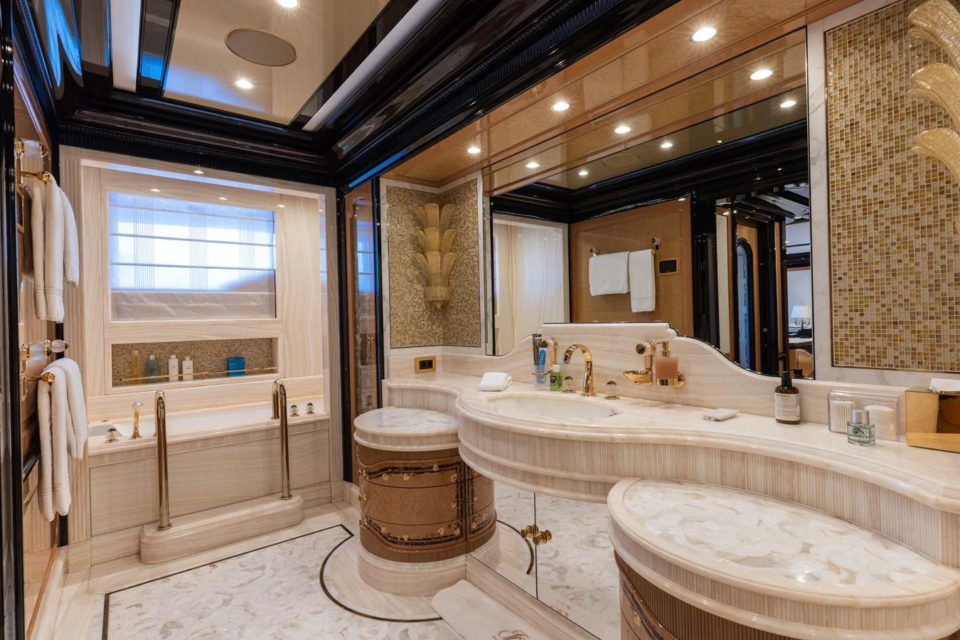 The luxurious bathroom features elegant fixtures and a spacious layout, perfect for relaxation. aboard I DYNASTY Yacht for Sale