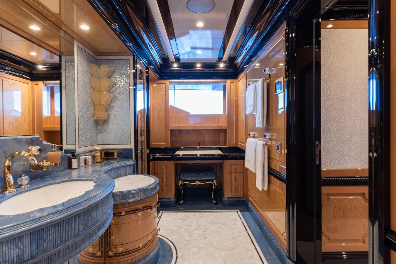The luxurious bathroom features elegant fixtures and a sophisticated design. aboard I DYNASTY Yacht for Sale