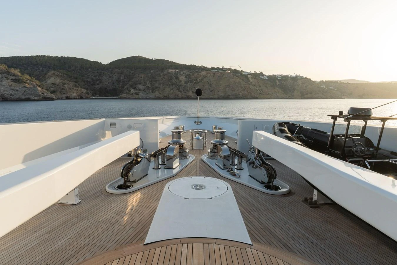 The yacht's foredeck features a clean, functional layout with winches and mooring equipment. aboard I DYNASTY Yacht for Sale