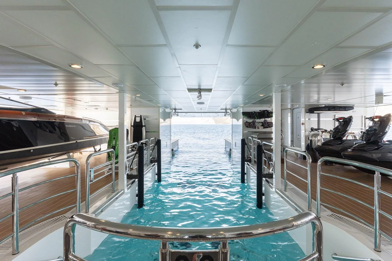 The yacht features a luxurious beach club with direct access to the water, perfect for relaxation and water activities. aboard I DYNASTY Yacht for Sale