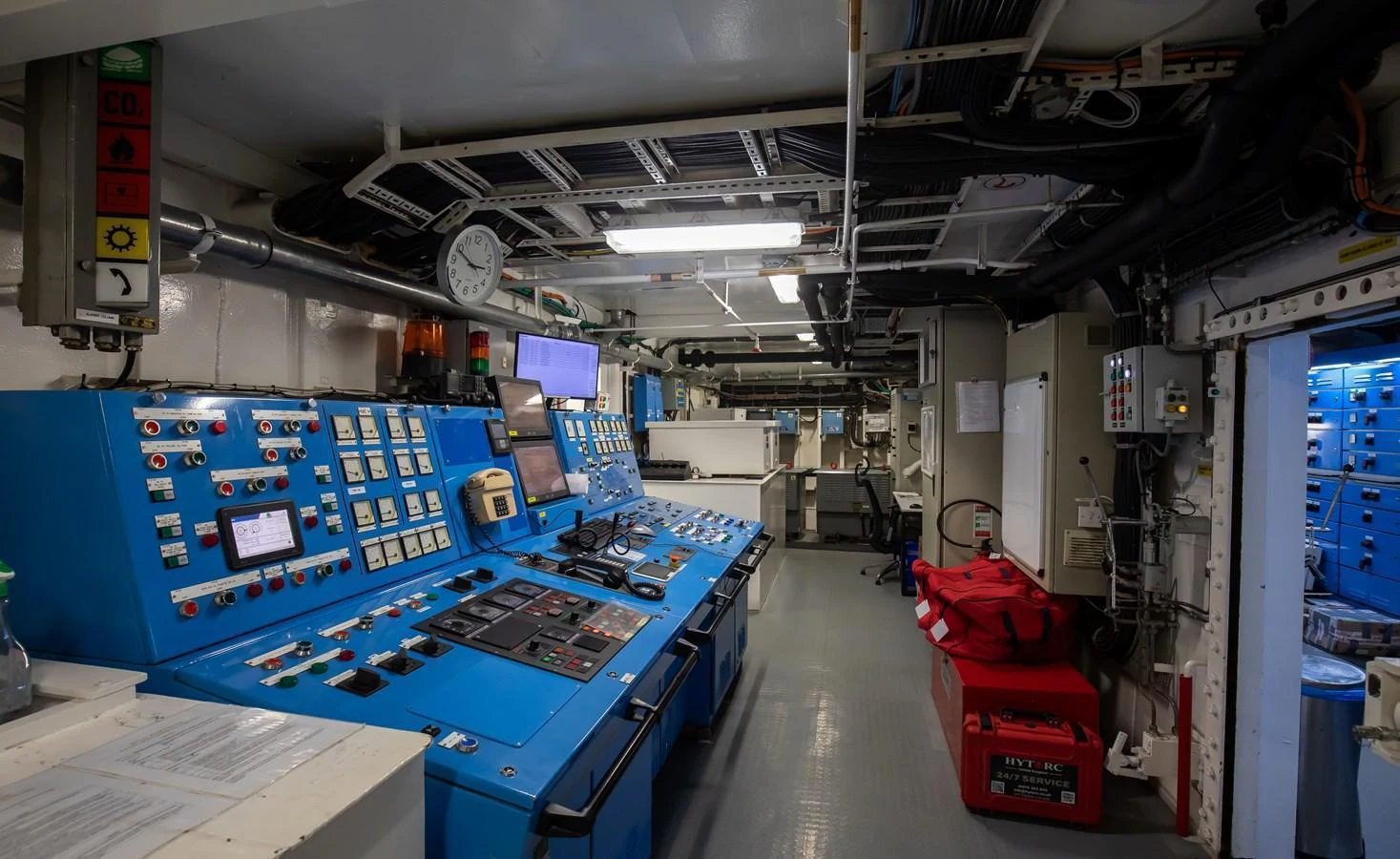 The engine room features a well-organized control panel with advanced monitoring systems. aboard SKY Yacht for Sale