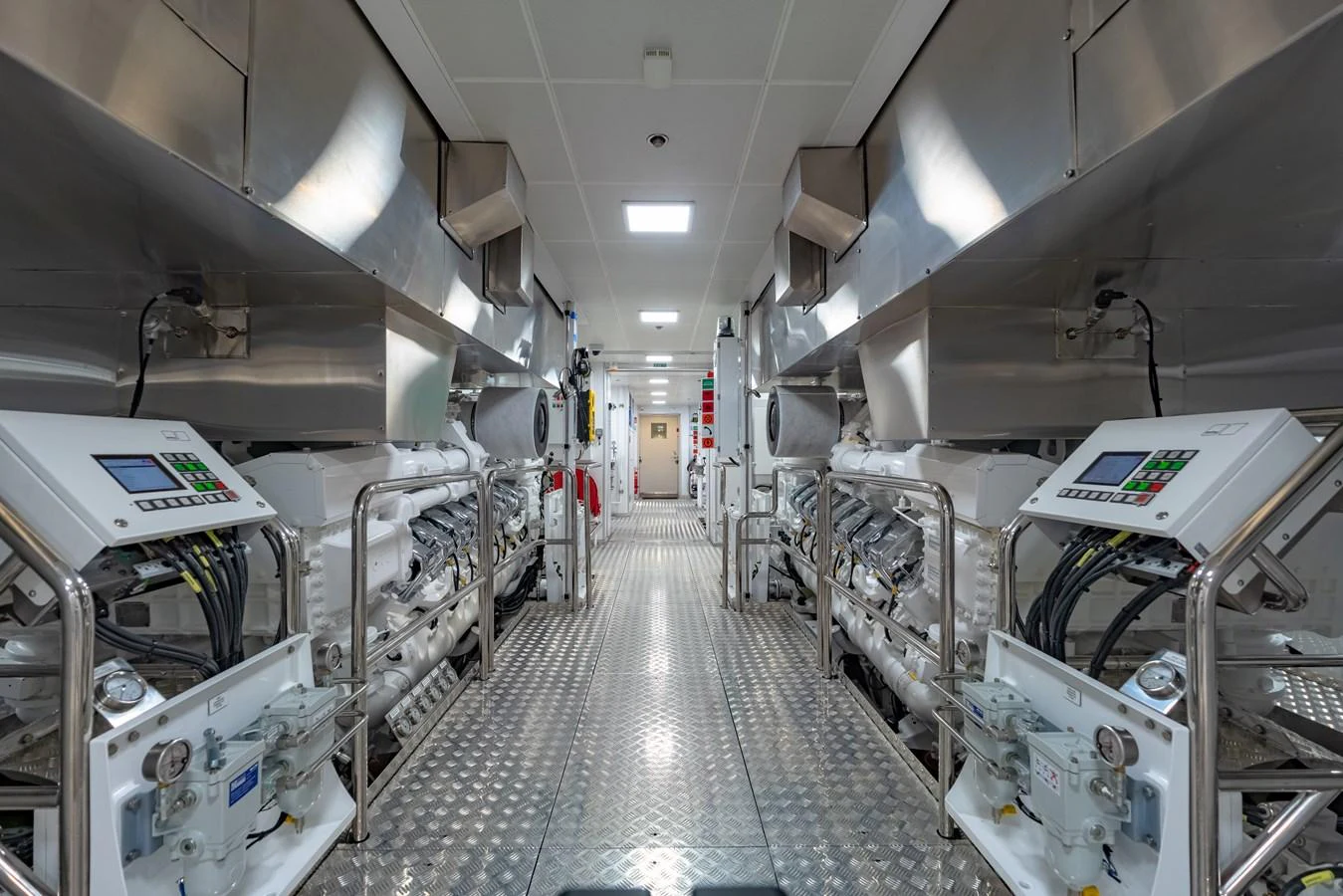 The engine room showcases state-of-the-art machinery and a meticulously organized layout. aboard WANDERLUST Yacht for Sale