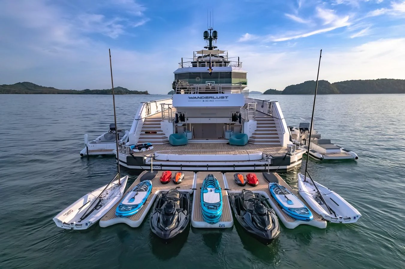 The yacht's aft deck is equipped with an impressive array of water toys, perfect for adventurous excursions. aboard WANDERLUST Yacht for Sale