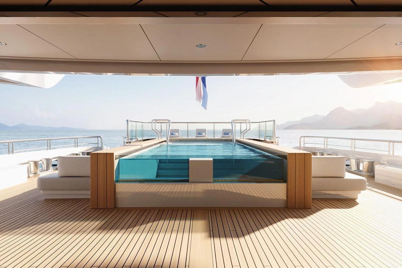 The aft deck features a luxurious infinity pool with stunning views of the sea. aboard AMELS 80 Yacht for Sale