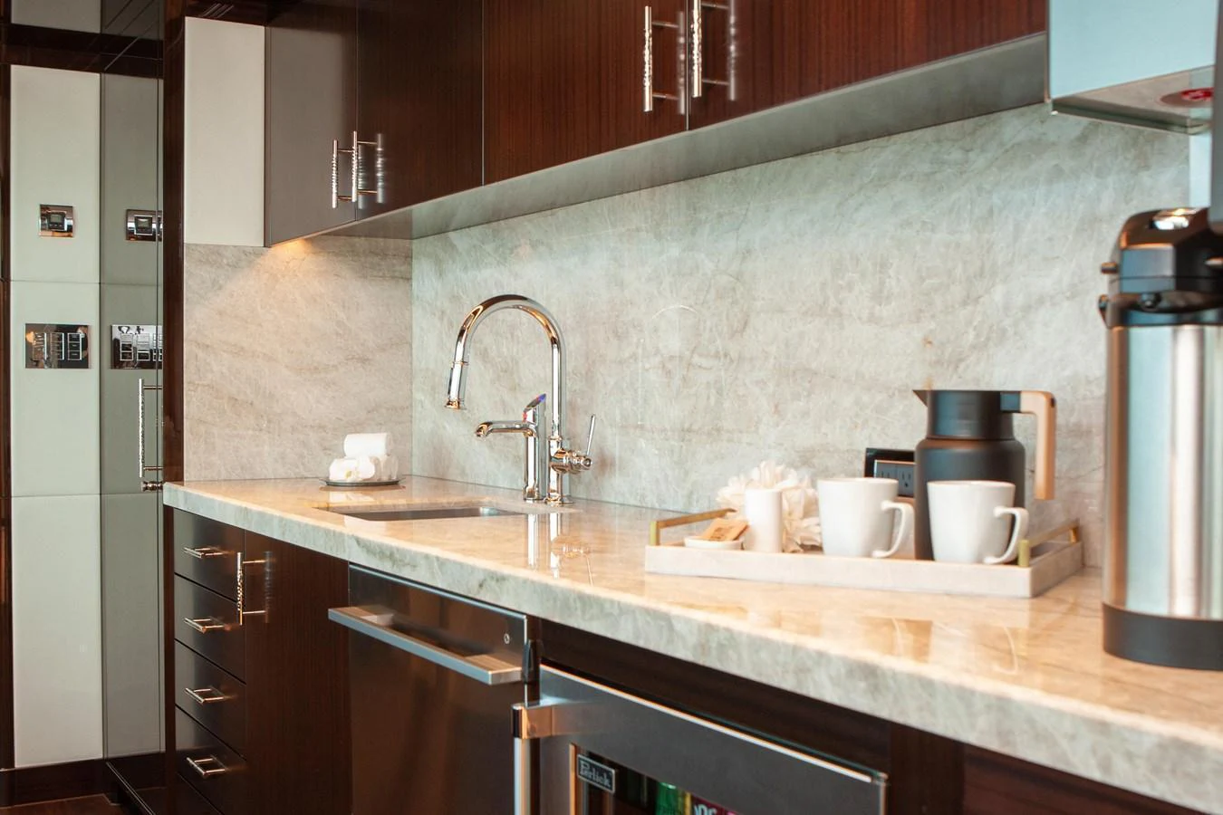 The galley features modern appliances and a sleek countertop, perfect for gourmet meal preparation. aboard BOARDWALK V Yacht for Sale