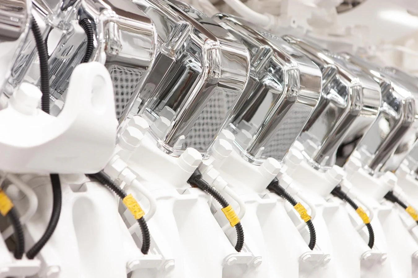 A close-up view of the yacht's pristine engine components showcases its powerful and well-maintained machinery. aboard BOARDWALK V Yacht for Sale