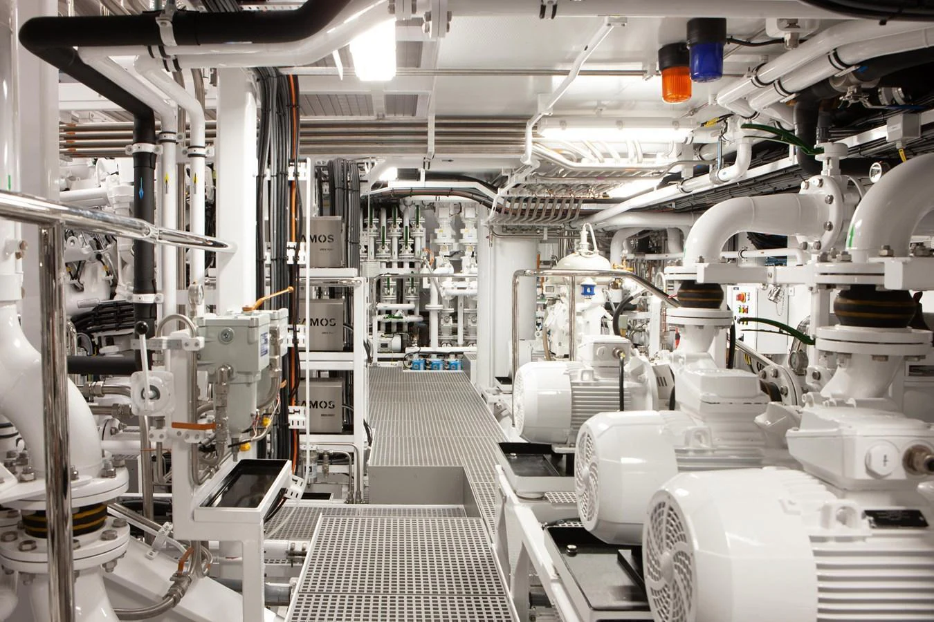 The image showcases the yacht's pristine and well-organized engine room with advanced machinery. aboard BOARDWALK V Yacht for Sale
