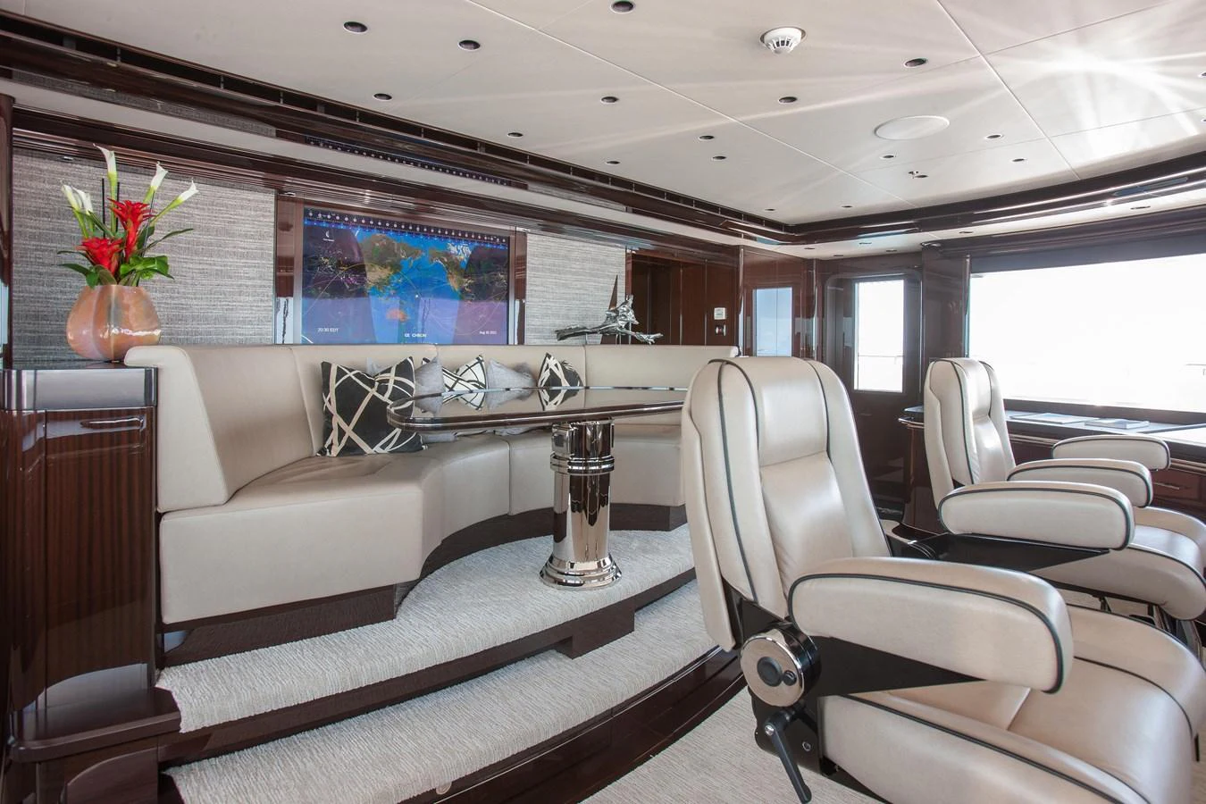The salon features plush seating and elegant decor, creating a luxurious and comfortable atmosphere. aboard BOARDWALK V Yacht for Sale