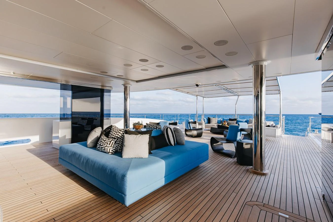 The aft deck features luxurious seating with a stunning ocean view. aboard ETERNITY Yacht for Sale