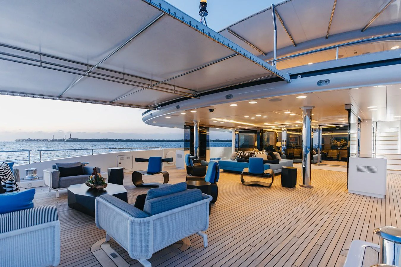 The spacious aft deck offers a luxurious outdoor lounging area with comfortable seating and stunning sea views. aboard ETERNITY Yacht for Sale